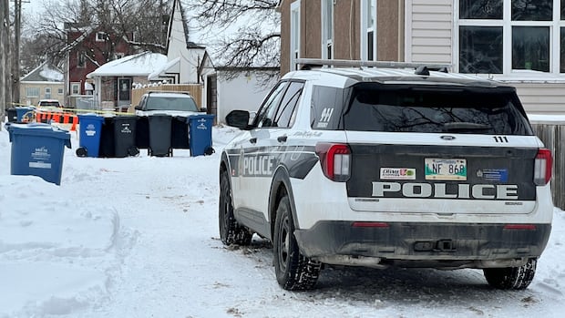 police-cordon-off-daniel-mcintrye-back-alley-after-residents-say-body-found-in-garbage-bin
