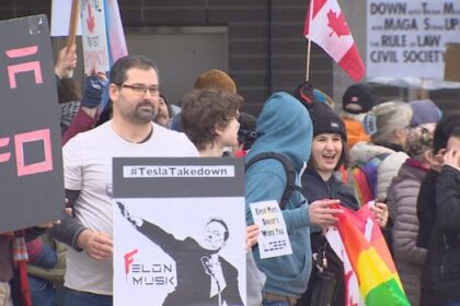 dozens-protest-at-metro-vancouver-tesla-dealerships,-call-for-stand-against-hate