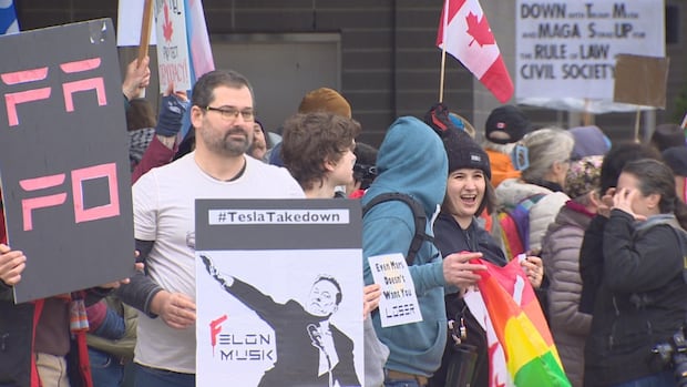 dozens-protest-at-metro-vancouver-tesla-dealerships,-call-for-stand-against-hate