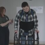how-a-device-called-an-exoskeleton-is-helping-one-nb.-man-get-back-on-his-feet
