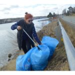 in-photo:-cleaning-her-community