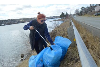 in-photo:-cleaning-her-community
