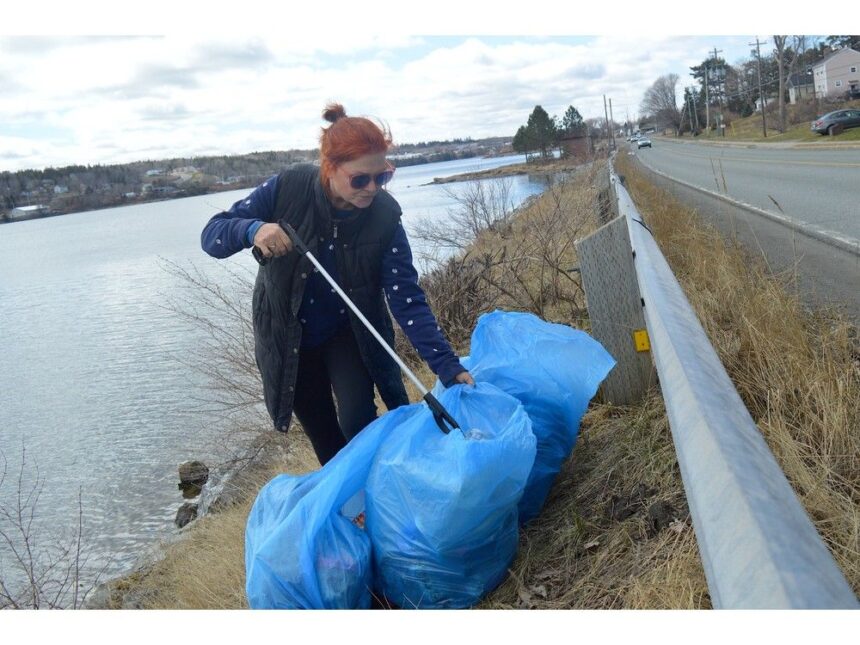 in-photo:-cleaning-her-community