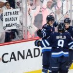 connor’s-late-goal-fuels-jets-to-5-3-win-over-blues-in-playoff-opener