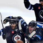 jets-captain-lowry-scores-game-7-winning-goal-in-double-ot-against-blues