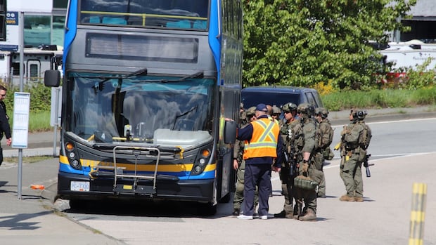 man-with-knife-taken-into-custody-after-barricading-himself-on-bus-in-delta:-police