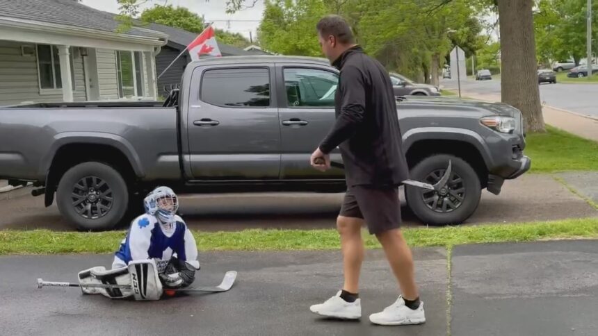 former-nhler-puts-7-year-old-goalie-through-paces-in-saint-john-driveway