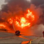 manitoba-premier-wab-kinew-tours-wildfire-zones-by-air-as-21,000-remain-out-of-homes