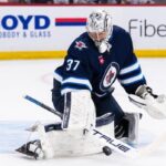 jets-goaltender-hellebuyck-cements-spectacular-campaign-with-hart,-vezina-awards