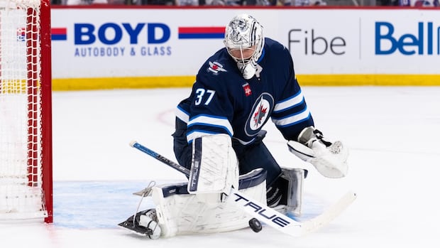 jets-goaltender-hellebuyck-cements-spectacular-campaign-with-hart,-vezina-awards