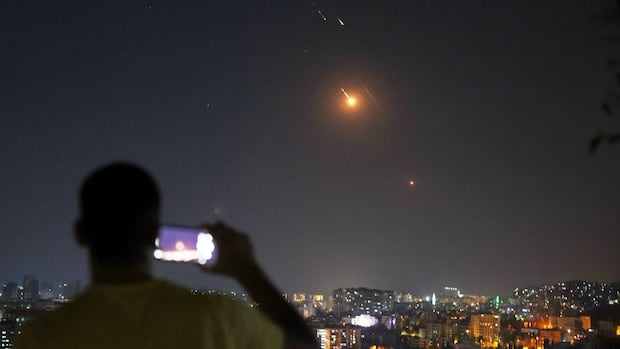 as-conflict-between-israel-and-iran-escalates,-canadians-with-ties-to-region-watch-anxiously