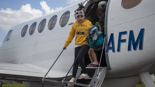 northern-wildfires-force-another-‘stressful’-evacuation-of-lynn-lake,-hundreds-touch-down-in-brandon
