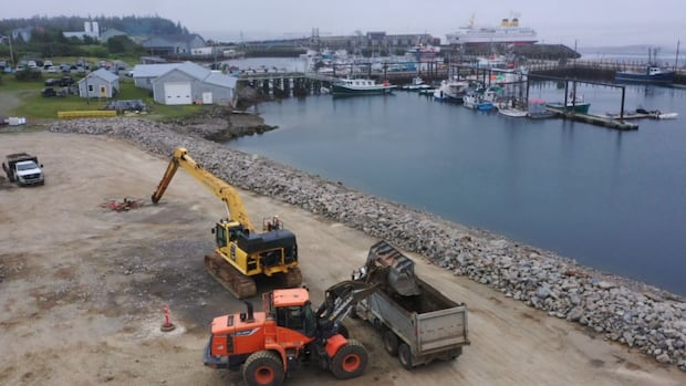 piles-of-dirt-removed-from-grand-manan-shore-after-blocking-harbour-views-for-years