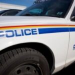 two-charged-after-rcmp-officer-dragged-by-suv,-pinned-against-cruiser
