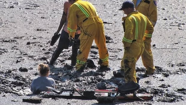 port-moody,-bc.,-officials-urge-people-to-stay-off-mudflats-which-can-act-like-quicksand