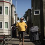 as-homes-tilt-in-the-mud,-floating-home-community-in-delta,-bc.,-fears-for-its-survival
