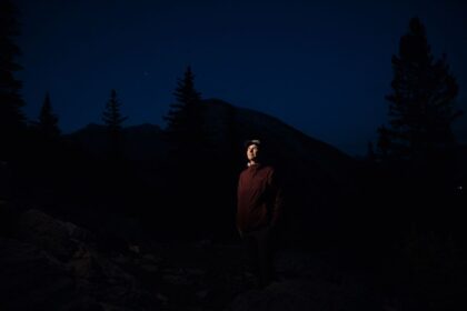 in-the-rockies,-more-and-more-people-are-heading-to-the-woods.-are-we-pushing-animals-deeper-into-the-night?