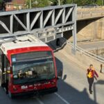 out-of-service-oc-transpo-bus-gets-stuck-under-shopping-mall-sign