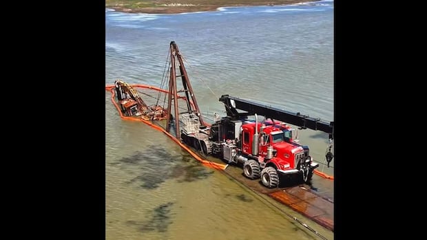 excavator-that-fell-through-ice-and-was-stranded-in-quill-lakes-for-over-a-decade-finally-pulled-out