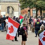 tennis-protestors-raise-racket-again-saturday,-drive-anti-immigration-demonstrators-away