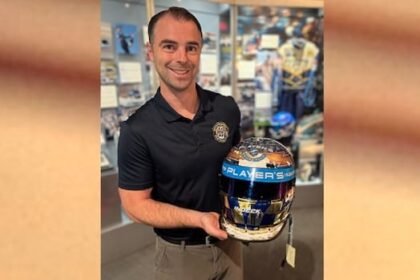 stolen-helmet-of-greg-moore-recovered-and-returned-to-bc.-sports-hall-of-fame