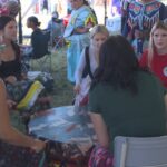 bringing-girls-to-the-drum-at-the-bilijk-powwow