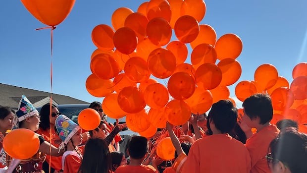 ‘letting-go’-burning-ceremony,-balloon-release-mark-orange-shirt-day-in-opaskwayak-cree-nation