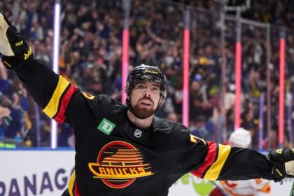 vancouver-canucks-dump-calgary-flames-5-1-in-season-opener