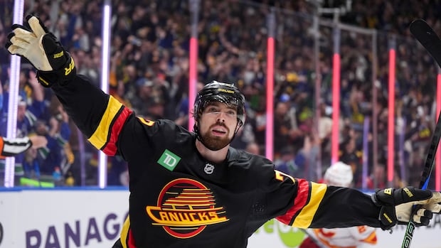 vancouver-canucks-dump-calgary-flames-5-1-in-season-opener