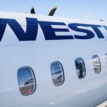 westjet-hikes-checked-bag-fee-for-2nd-time-in-2-years.-will-air-canada-be-next?