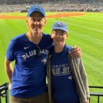 saskatoon-father-and-son-go-the-distance-to-catch-toronto-blue-jays-alcs-game