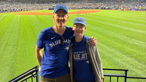 saskatoon-father-and-son-go-the-distance-to-catch-toronto-blue-jays-alcs-game