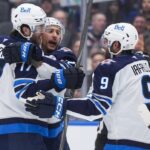 jets-halt-3-game-slide-with-road-5-3-win-over-canucks-in-vancouver