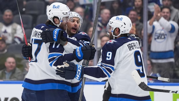 jets-halt-3-game-slide-with-road-5-3-win-over-canucks-in-vancouver