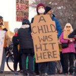 winnipeggers-rally-at-intersection-where-boy-was-hit-by-car-while-crossing-street-on-bike