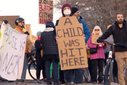 winnipeggers-rally-at-intersection-where-boy-was-hit-by-car-while-crossing-street-on-bike