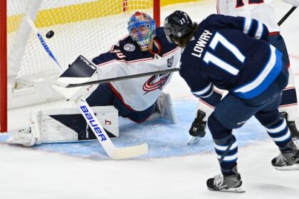 winnipeg-beats-columbus-5-2,-as-adam-lowry-scores-1st-goal-after-return-from-surgery
