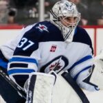 winnipeg-jets-goalie-connor-hellebuyck-out-at-least-a-month-for-knee-surgery