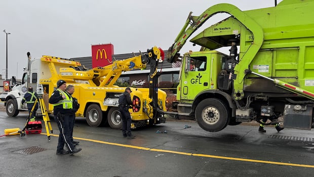 woman,-34,-seriously-injured-after-being-hit-by-garbage-truck