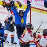 natalie-spooner-lifts-sceptres-over-charge