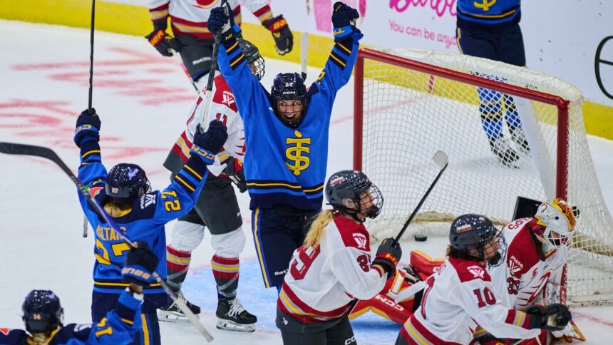 natalie-spooner-lifts-sceptres-over-charge