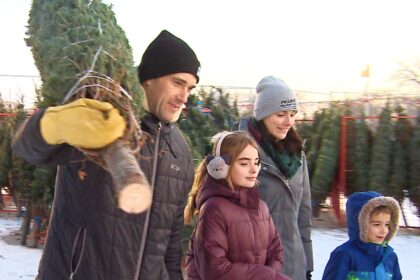 christmas-tree-sale-gives-young-football-players-a-way-to-give-back